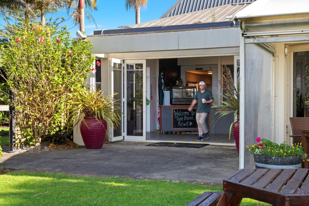 Entrance to Taipa Beach Resort Restaurant in Doubtless Bay, Northland, offering relaxed beachfront dining just steps from the beach.